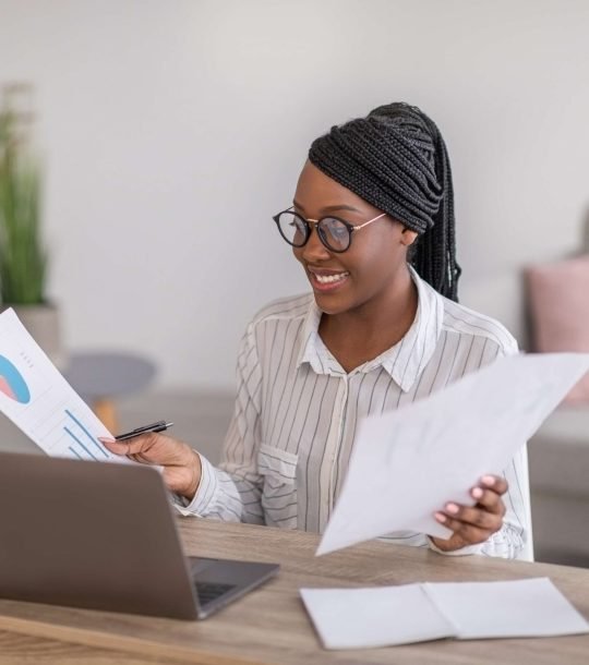 professional-woman-analyzes-charts-at-home-office-2026-01-09-06-56-10-utc(1)