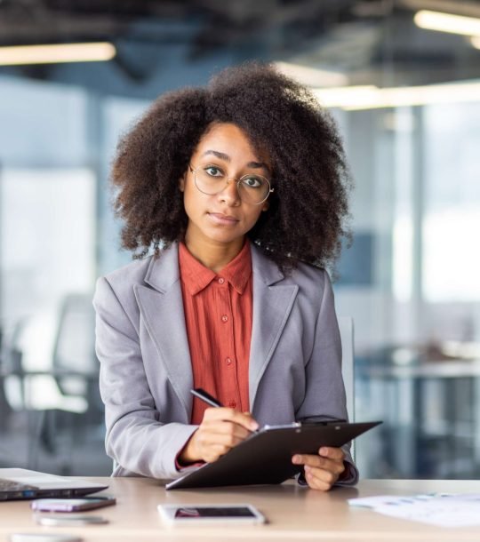 professional-young-woman-working-at-her-office-des-2026-01-09-07-39-44-utc(1)